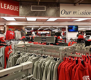 Racks of clothing inside UW Bookstore