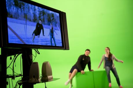 Playing with a green screen at the Imagine RIT Festival