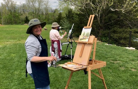 woman painting at the Augusta Plein Air Painting