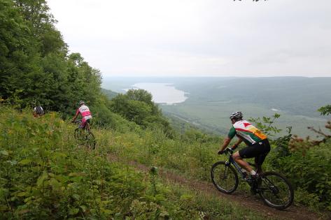 finger-lakes-harriet-hollister-state-park-fall-scenic-view-mountain-bikers-trail-group-green-pink