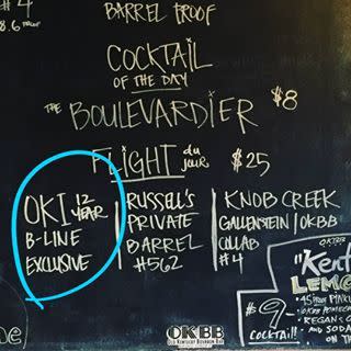The famous chalkboard menu at Old Kentucky Bourbon Bar