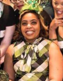 A close-up of Khadija B. Wallace, owner of Joyful Treats Catering