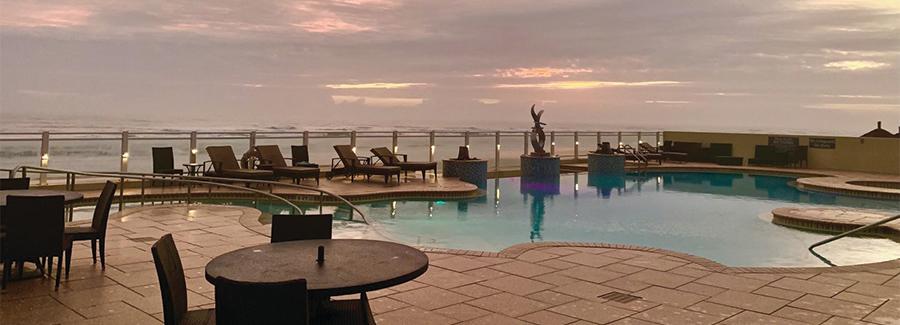 A beautiful sunrise greets you from the pool deck of the Residence Inn by Marriott Daytona Beach Oceanfront