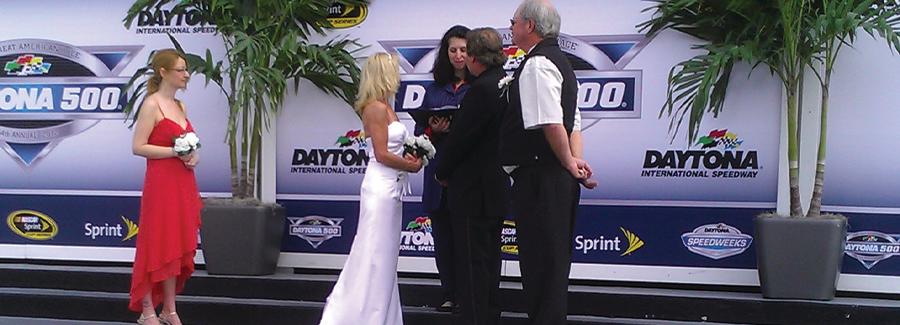 A couple gets married at Daytona International Speedway's Victory Lane