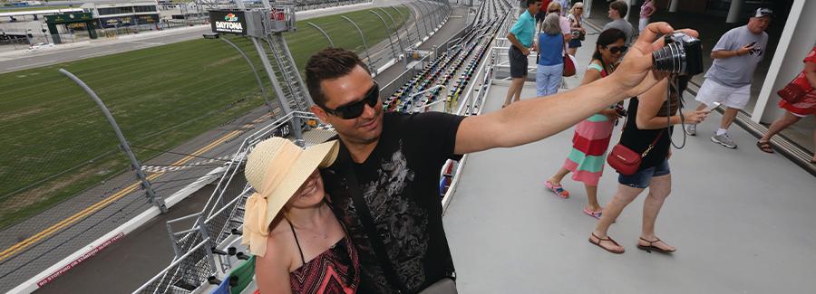 A couple takes a selfie at Daytona International Speedway