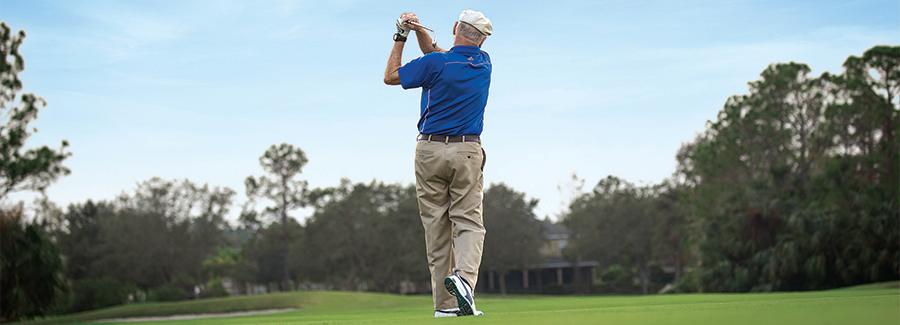 A solo golfer enjoys the greens while golfing in Daytona Beach