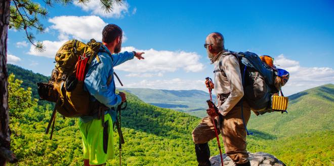 Hikers near Roanoke enjoying the view of the Blue Ridge Mountains