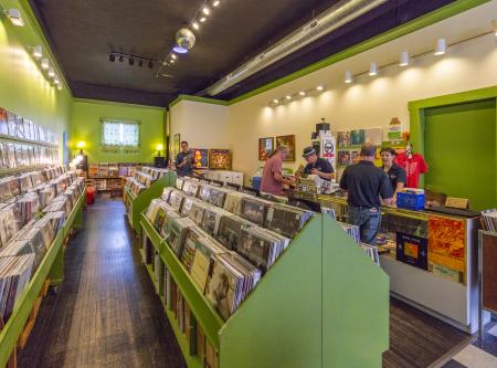 View of vibrant interiors and aisles, shoppers at Spoonful Records