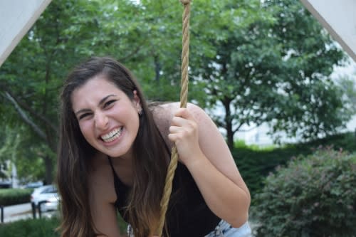 UGA student pulling on rope to ring chapel bell