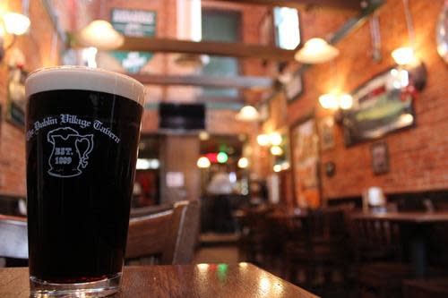 A pint of Guinness inside the Dublin Village Tavern.