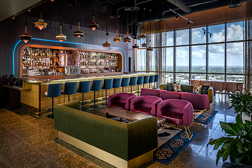 Sparrow is rooftop restaurant and bar with a groovy '60s flair and inside-outside seating.