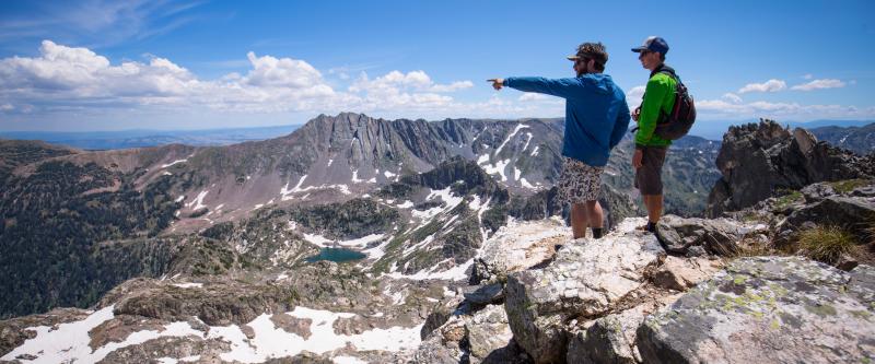Hikers take in the view in the Zirkel Wilderness Area outside of Steamboat Springs, CO