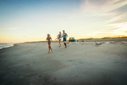 Family on Beach at Fort Fish State Recreation Area