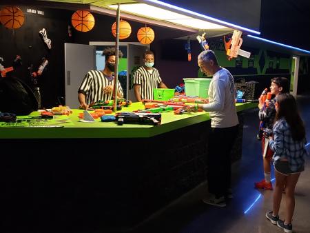 Pick out your favorite plastic gun during foam wars at Press Play Gaming Lounge