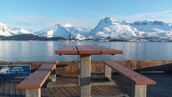 a picnic table at a dock