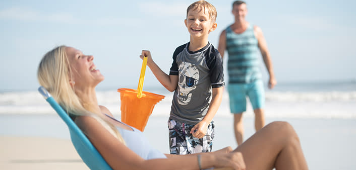 A family enjoys beach time together in Daytona Beach