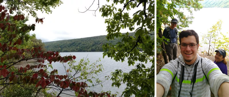 Hiking group takes a selfie on the wooded shoreline of Hemlock Lake in New York's Finger Lakes.
