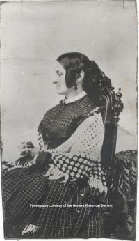 Writer Sarah Bradford is pictured sitting in a chair