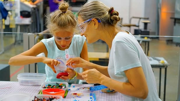 People making crafts at Corning Museum of Glass