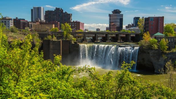 The skyline of Rochester, NY with High Falls in the middle