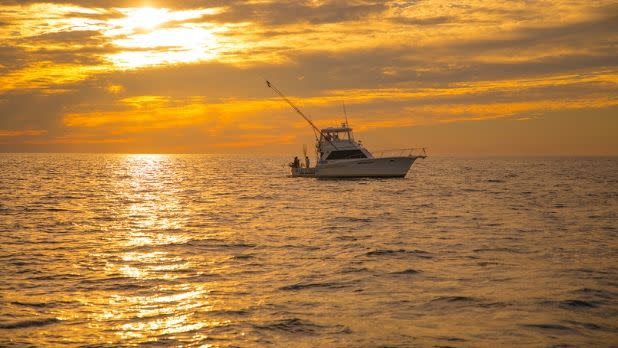 Fishing charter boat during sunset, Oswego County, New York