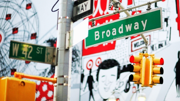 A photo of the Broadway and 42nd street intersection street sign