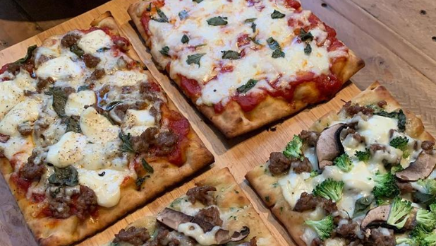 A picture of four pizzas from Callicoon Farmer's Market