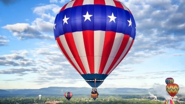 A hot air balloon in American flag colors with stars and stripes