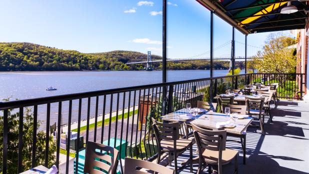 Outside patio of Shadow on the Hudson overlooking bridge