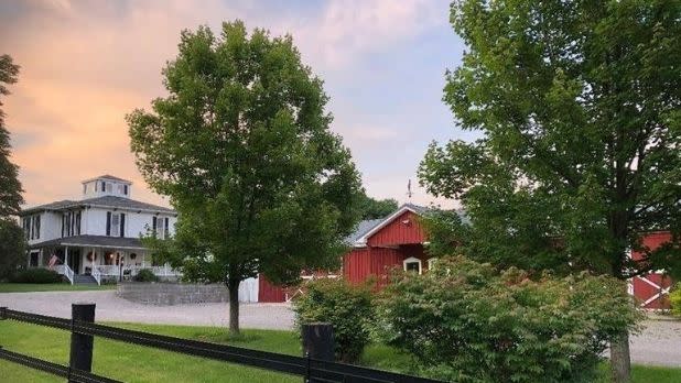 A view of a house and farm at Letchworth Farm B&B