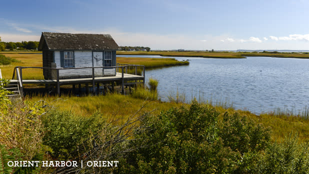 A photo of a shack on the shore of Orient Harbor