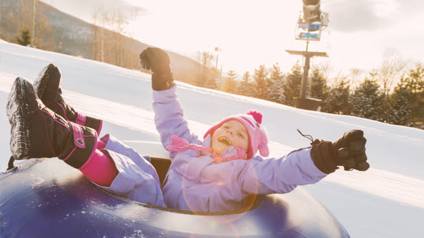 Child Inter-tubing on Snow