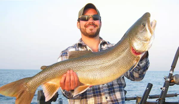 Fisher shows huge catch from Charter Fishing trip on Lake Michigan