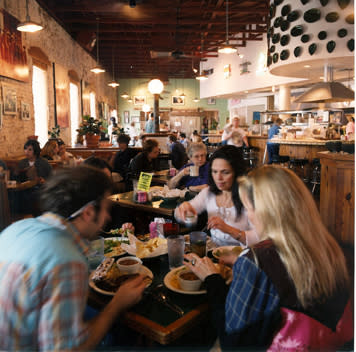 Eat all of the tacos! Diners chowing down at Gueros Taco Bar on South Congress. Photo provided by Gueros Taco Bar.