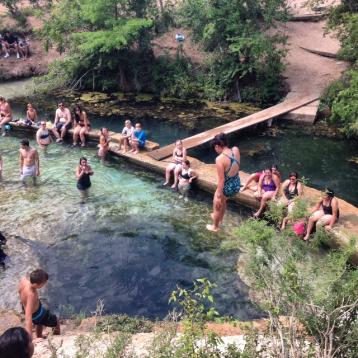 Diving into Jacob's Well. Photo courtesy of Kristen Maruel. 