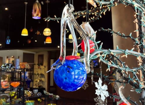 A glass-blown ornament for sale in Columbia SC