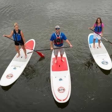 Paddleboarding at Canoe & Kayak Rentals and Sales