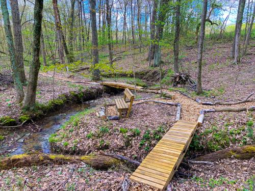 Wooden bridge over ravine in Mount Saint Francis