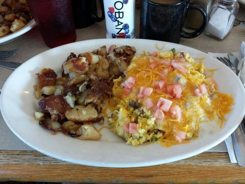 Plated scrambled eggs with Potatoes at The Brunch Club in Dayton, OH