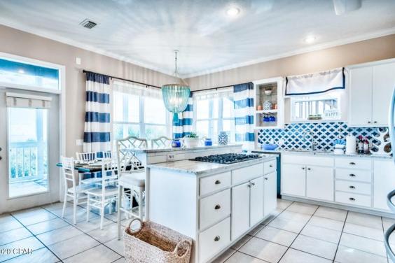 Enjoy cooking in this large kitchen while still watching the waves!