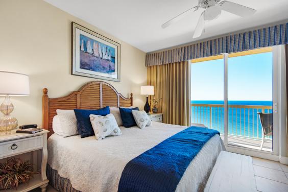 Stunning master with sliding glass doors to the balcony, flat screen tv, & dvd player