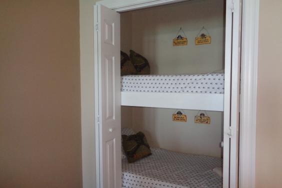 Bunkies (full size twin beds) hidden in an alcove area***children love these