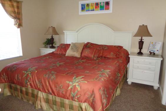 Master bedroom with king bed, tv, master bath with garden tub