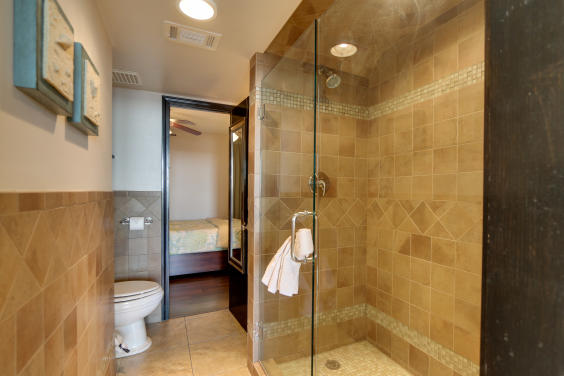 Renovated bathroom with large tiled shower