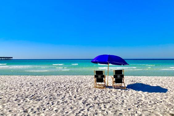 Beach chairs and umbrella