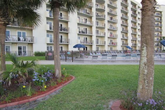 BEAUTIFULLY LANDSCAPED GROUND WITH LOTS OF GRASSY AREAS FOR KIDDIES!
