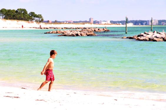 Little Boy Playing at St. Andrews State Park in Panama City Beach Florida