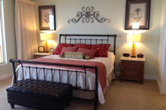 The Master Bedroom features a sleigh bed.