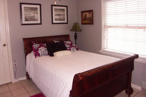 Gloria's Sleigh Bedroom With Luxury Linens