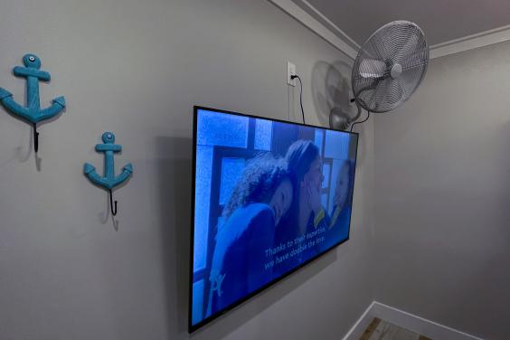 Bunk Room TV and Wall Fan